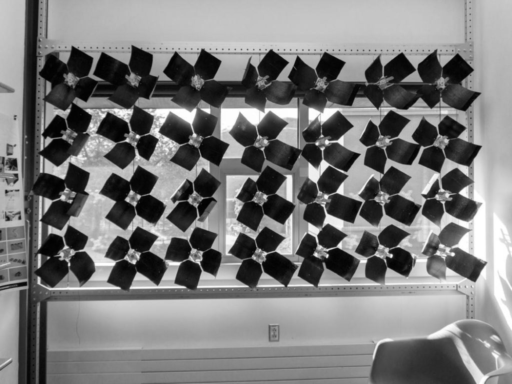 Adpative screen system shown in front of a window