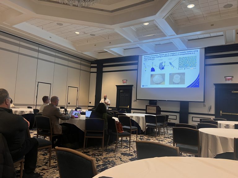 A research presentation occurring in a conference room